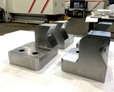 Pezzo unico in acciaio realizzato tramite lavorazione meccanica CNC